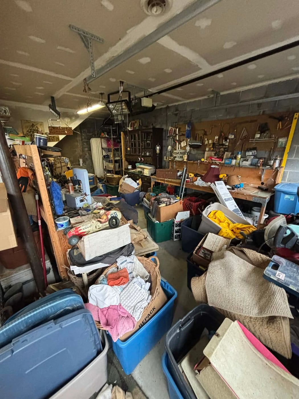 Garage filled with items before a cleanout